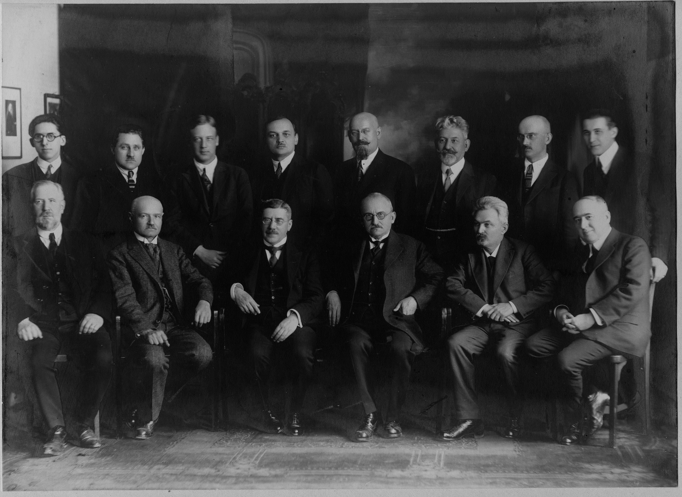 Historical photo: Belgrade Mathematical School 1926. Miloš Radojčić, Tadija Pejović, Vjačeslav Žardecki, Anton Bilimović, Petar Zajankovski, (Jelenko Mihailović, the seismologist), Radivoj Kašanin, Jovan Karamata (standing), Nikola Saltikov, Mihailo Petrović, (Pavle Popović, the chancellor), Bogdan Gavrilović, (K. Petković, the chancellor of the Faculty of Philosophy), Milutin Milanković (sitting). (SASA Archive, 14197/16)